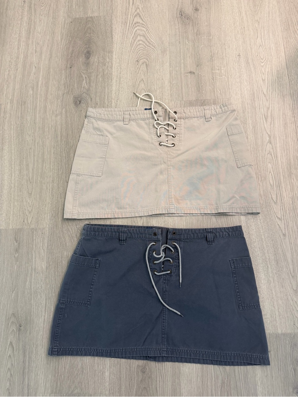 set of 2 matching  Women’s Lace-Up Mini skirts 
sz large in 100 percent cotton